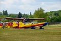 Closeup of colorful Extra EA-300 airplane models at Hangariada aeronautical festival show