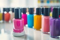 closeup of colorful nail polish bottles on white manicure table Royalty Free Stock Photo