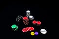 Closeup of colorful stacks of poker chips in the black background Royalty Free Stock Photo