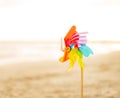 Closeup on colorful windmill toy on the beach Royalty Free Stock Photo