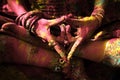 Closeup of colorful woman hand in mudra gesture practice yoga outdoor