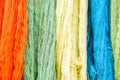 Closeup colorful yarns for woven fabrics background and texture