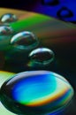 Closeup of compact disk with big water droplets Royalty Free Stock Photo