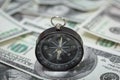 Closeup of a compass on U.S. Dollar banknotes Royalty Free Stock Photo