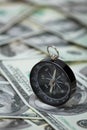 Closeup of a compass on U.S. Dollar banknotes Royalty Free Stock Photo