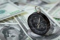 Closeup of a compass on U.S. Dollar banknotes Royalty Free Stock Photo
