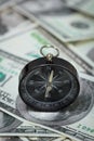 Closeup of a compass on U.S. Dollar banknotes Royalty Free Stock Photo
