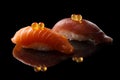 Closeup composition of fresh salmon sashimi sushi with caviar on dark background Royalty Free Stock Photo