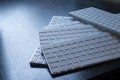 Closeup of computer keyboards on a black dark desk Royalty Free Stock Photo