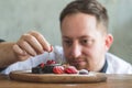 Closeup of a concentrated male pastry chef