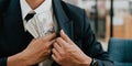 Closeup conceptual photo of bribed man putting money in the suit pocket. banner concept. Royalty Free Stock Photo