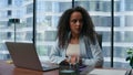 Concerned woman feeling nervous work laptop. Anxious boss calming after meeting