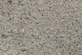 Closeup on concrete, small pebbles, background