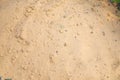 Closeup of construction sand with clumps and small stones Royalty Free Stock Photo