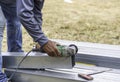 Closeup of construction workers' hands cutting steel Royalty Free Stock Photo