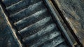 A closeup of the conveyor belt showing the gritty texture of the rubber and metal materials used to withstand heavy Royalty Free Stock Photo