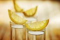 Closeup cool glass of vodka with lemon. Royalty Free Stock Photo