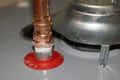 Copper pipe for hot water sealed on water heater Royalty Free Stock Photo