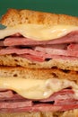 Closeup of corned beef sandwich with cheese on rye Royalty Free Stock Photo