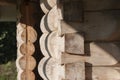 Corner and frame of doors of log house from spruce with moss Royalty Free Stock Photo