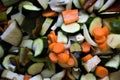 closeup of courgettes, carrots, peppers, onion, aubergines and garlic cut ready to be cooked Royalty Free Stock Photo