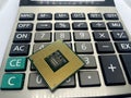 Closeup of CPU microprocessor chip with golden contacts on calculator Royalty Free Stock Photo