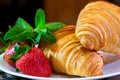 close-up of croissant sprinkled serving cook at home decorate many different videos with strawberries and chocolate