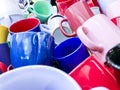 Closeup and crop colorful heap of ceramic coffee cup fit on screen background