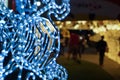 Closeup and crop decorated led of Christmas blue lighting in snowflake shape on blurry background Royalty Free Stock Photo