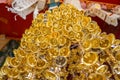 Look up view of of many small golden bells was hung in a group in Thai temple. Royalty Free Stock Photo