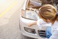 Closeup and crop sufferer woman point out the damage on her car