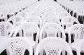 White plastic chairs put on lined in rows for students in the graduation ceremony Royalty Free Stock Photo