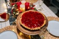 Closeup cropped shot of holiday dinner table is served dishes, cutlery, candles. Celebration birthday, wedding Royalty Free Stock Photo