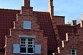 Closeup of a crow-stepped gable of a traditional building in Belgium