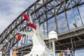 Closeup of cruise ship mast about to pass under Sydney Harbour Bridge