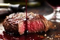 closeup of crusty steak surface mopped with glossy red wine reduction Royalty Free Stock Photo