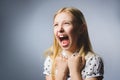 Closeup crying girl with worried stressed expression on gray background