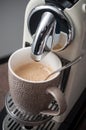 Cup of coffee expresso on cofffee machine Royalty Free Stock Photo