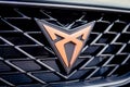 Closeup of Cupra logo golden sign