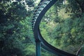 Closeup Curves of steel rails Background image is a forest garden