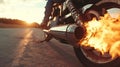 A closeup of a customized motorcycles exhaust pipes with small but intense flames bursting out as the rider accelerates Royalty Free Stock Photo