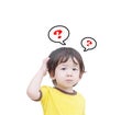 Closeup cute asian kid in confuse motion with question mark sign isolated on white background