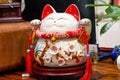 Closeup of a cute ceramic lucky cat piggy bank