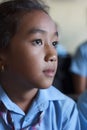 Closeup of a cute girl studying in a class in Kath