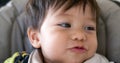 closeup of cute mixed race half asian baby boy smiling and laughing Royalty Free Stock Photo