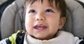 closeup of cute mixed race half asian baby boy smiling and laughing Royalty Free Stock Photo
