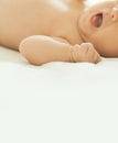 Closeup of cute newborn baby yawns Royalty Free Stock Photo