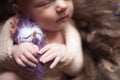 Closeup Infant baby girl sleeping at background. Newborn and mothercare concept Royalty Free Stock Photo