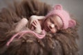 Closeup infant baby girl sleeping at background. Newborn and mothercare concept Royalty Free Stock Photo