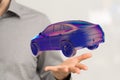 Closeup of 3d rendered car in a man's pal